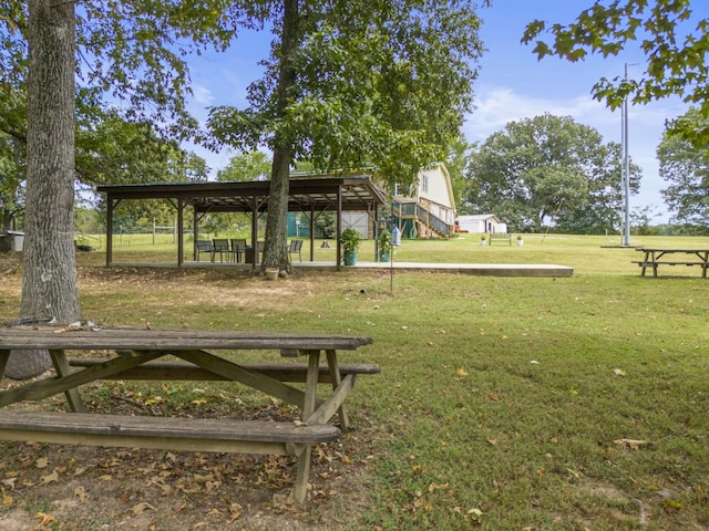 surrounding community featuring a lawn