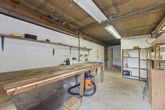 garage with a workshop area