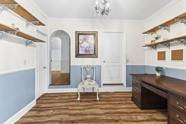 interior space with crown molding, dark wood-type flooring, and an inviting chandelier