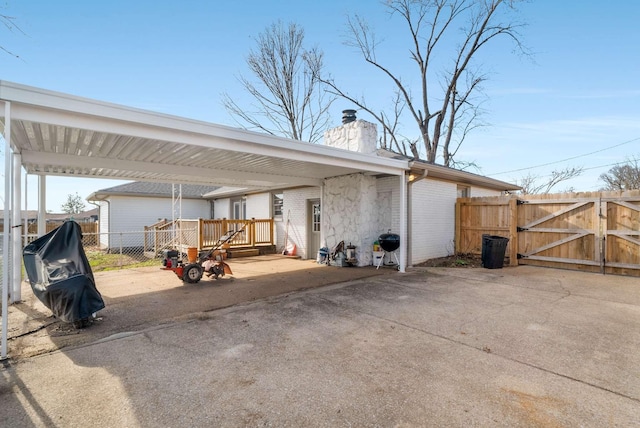 view of patio / terrace featuring a carport