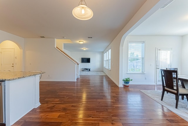 interior space with dark hardwood / wood-style flooring