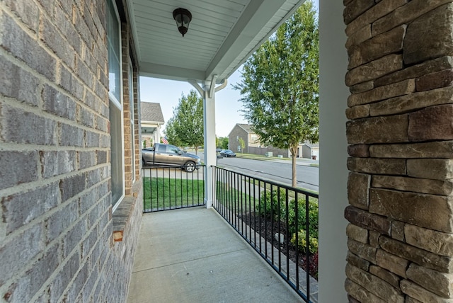 balcony featuring a porch