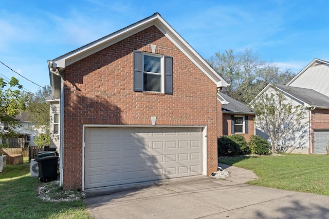 view of front of house featuring a garage and a front yard