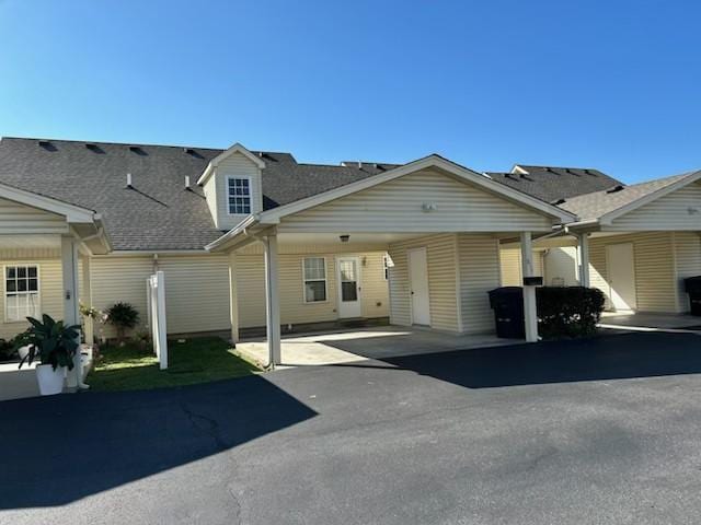 view of front of house featuring a carport