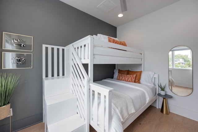 bedroom featuring hardwood / wood-style flooring