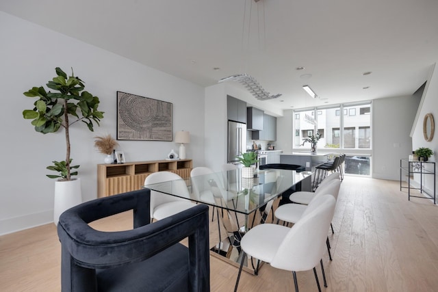 dining room featuring light wood-type flooring