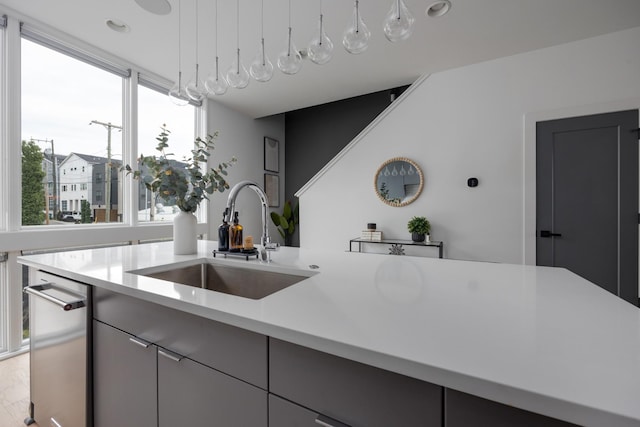 kitchen with gray cabinets and sink