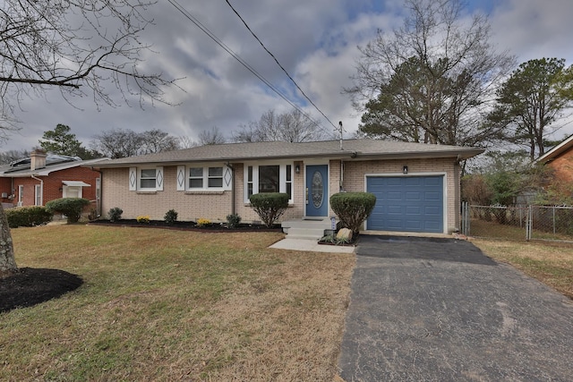 ranch-style house with a front lawn and a garage