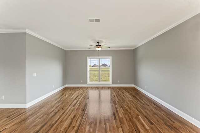 unfurnished room featuring wood-type flooring, ceiling fan, and ornamental molding