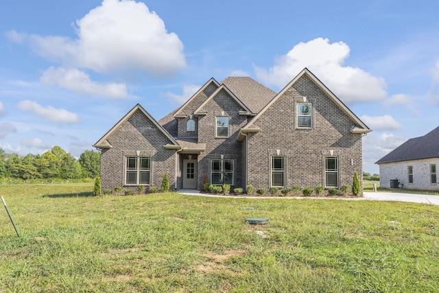 view of front of home featuring a front lawn