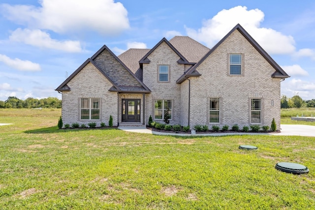 view of front of home with a front yard