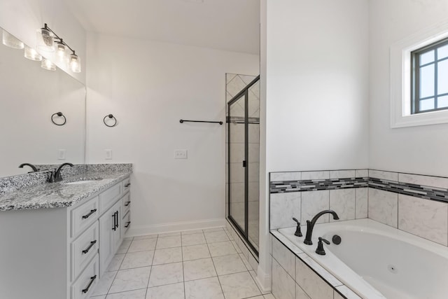 bathroom featuring tile patterned floors, vanity, and shower with separate bathtub