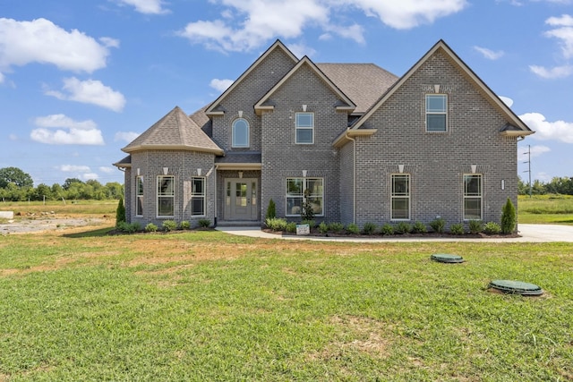 view of front of house with a front lawn