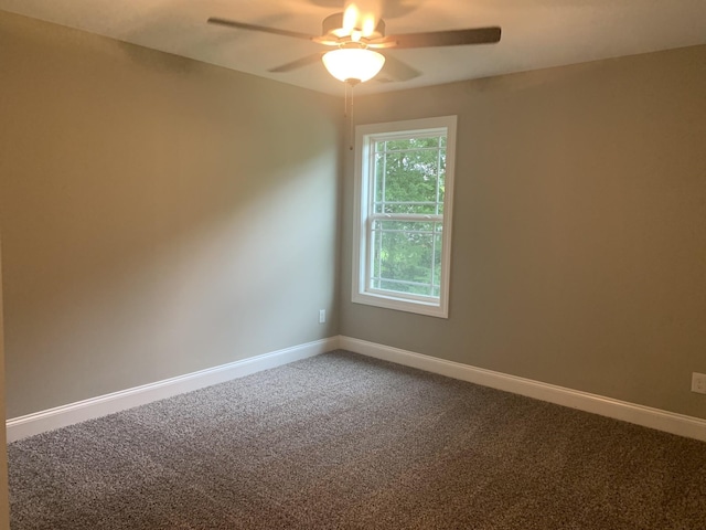 unfurnished room featuring carpet and ceiling fan