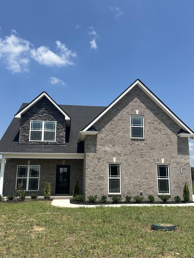 view of front of property with a front yard