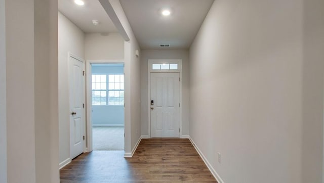 doorway to outside with hardwood / wood-style floors