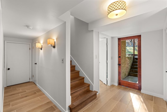 entrance foyer with light wood-type flooring