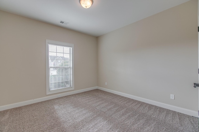 view of carpeted spare room