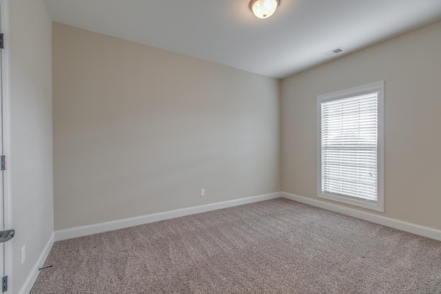 unfurnished room with carpet