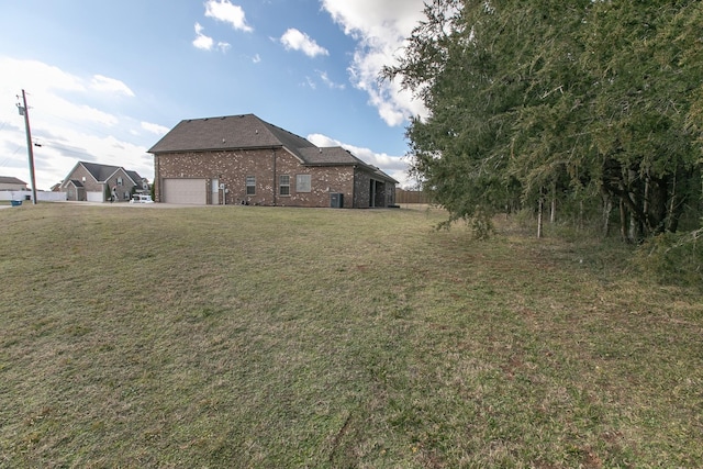 view of yard featuring a garage