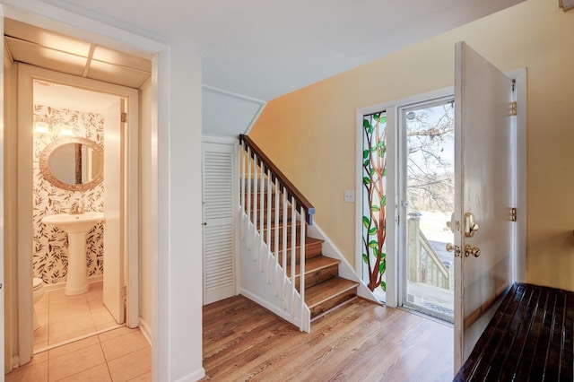 foyer with light hardwood / wood-style floors