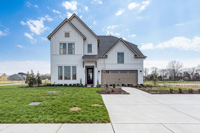 modern farmhouse style home with a front lawn and a garage