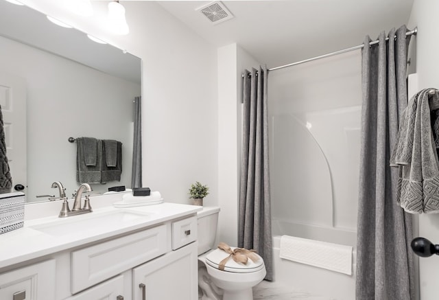 full bathroom featuring vanity, shower / bath combination with curtain, and toilet