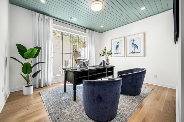 office area featuring light hardwood / wood-style flooring and wood ceiling