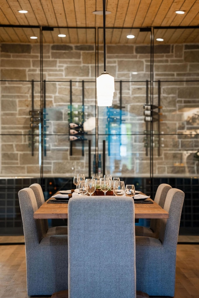 dining area featuring wood ceiling