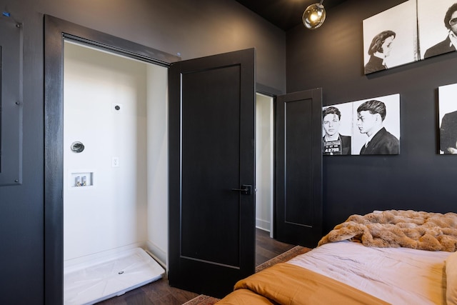 bedroom featuring dark wood-type flooring