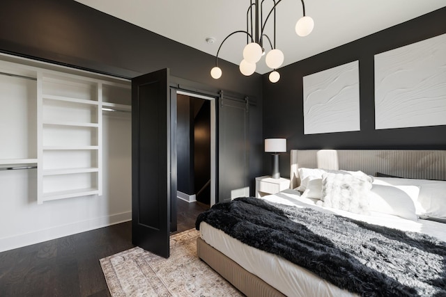 bedroom featuring wood-type flooring