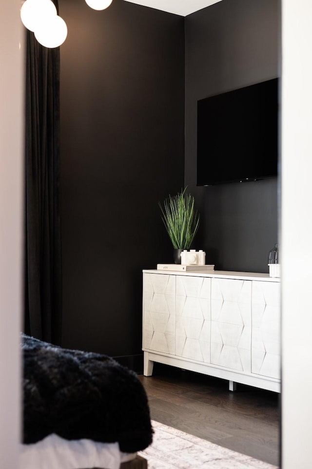 bedroom with wood-type flooring