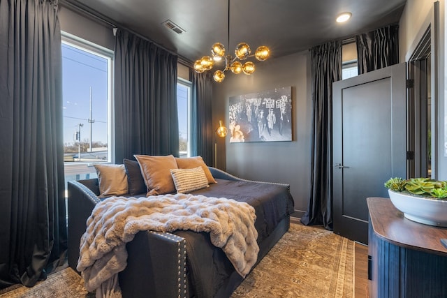 bedroom with a chandelier