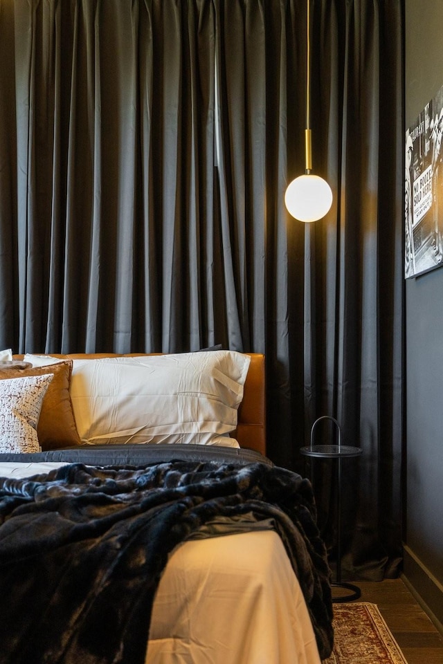 bedroom featuring hardwood / wood-style flooring