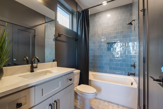 full bathroom featuring toilet, vanity, and shower / bath combo with shower curtain