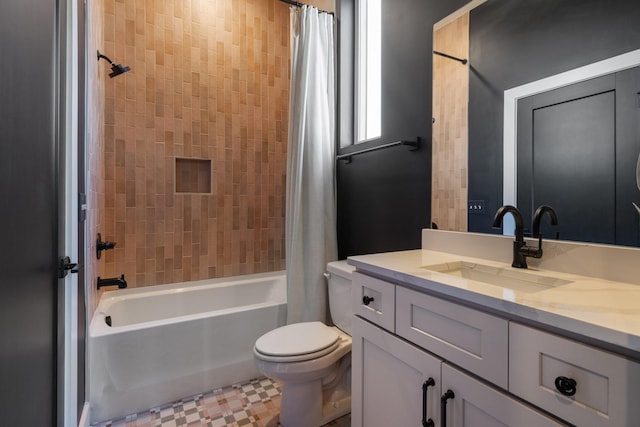 full bathroom featuring toilet, vanity, and shower / tub combo with curtain