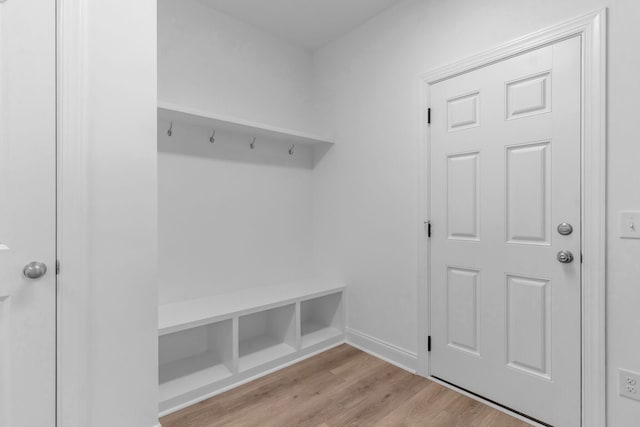 mudroom with light hardwood / wood-style flooring