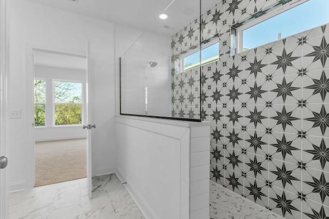 bathroom featuring a shower