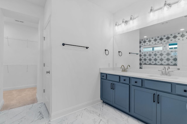 bathroom featuring vanity and walk in shower