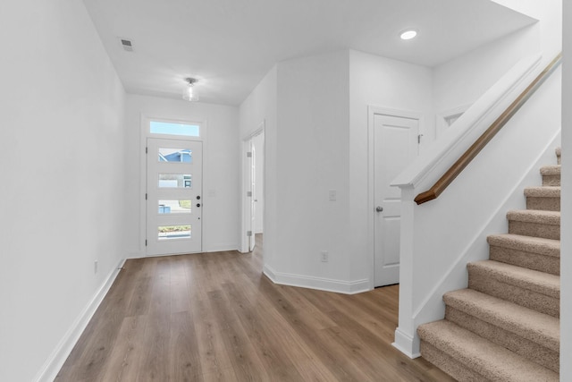 foyer featuring wood-type flooring