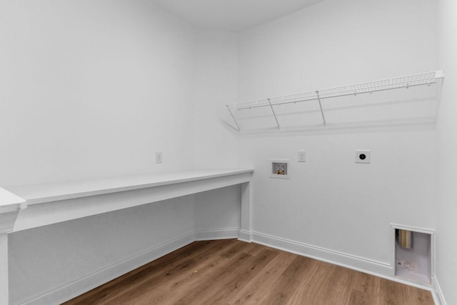 laundry room featuring washer hookup, electric dryer hookup, and hardwood / wood-style flooring