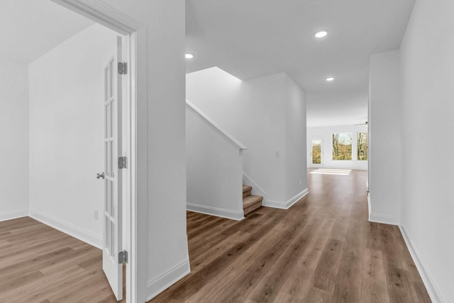 corridor featuring hardwood / wood-style flooring