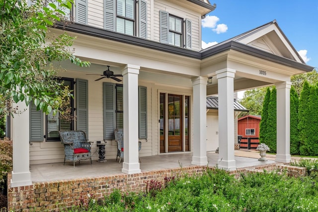 entrance to property featuring covered porch and ceiling fan