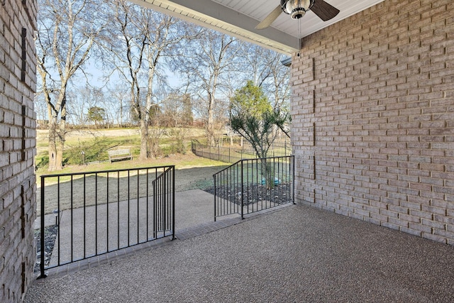 view of patio / terrace featuring ceiling fan