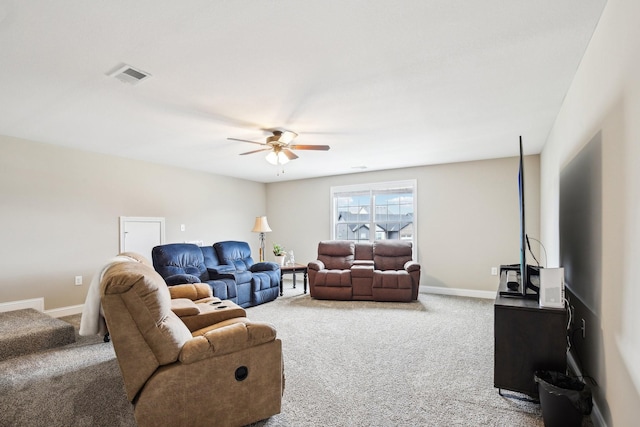 living room with carpet flooring and ceiling fan