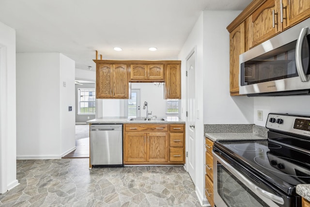 kitchen featuring sink and appliances with stainless steel finishes