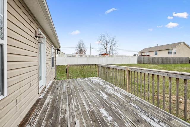 deck featuring a lawn