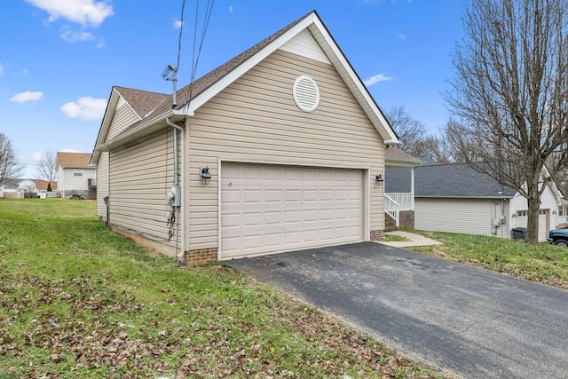 view of property exterior with a lawn and a garage