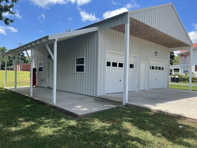 garage featuring a yard