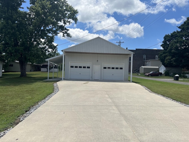 garage featuring a lawn and a carport